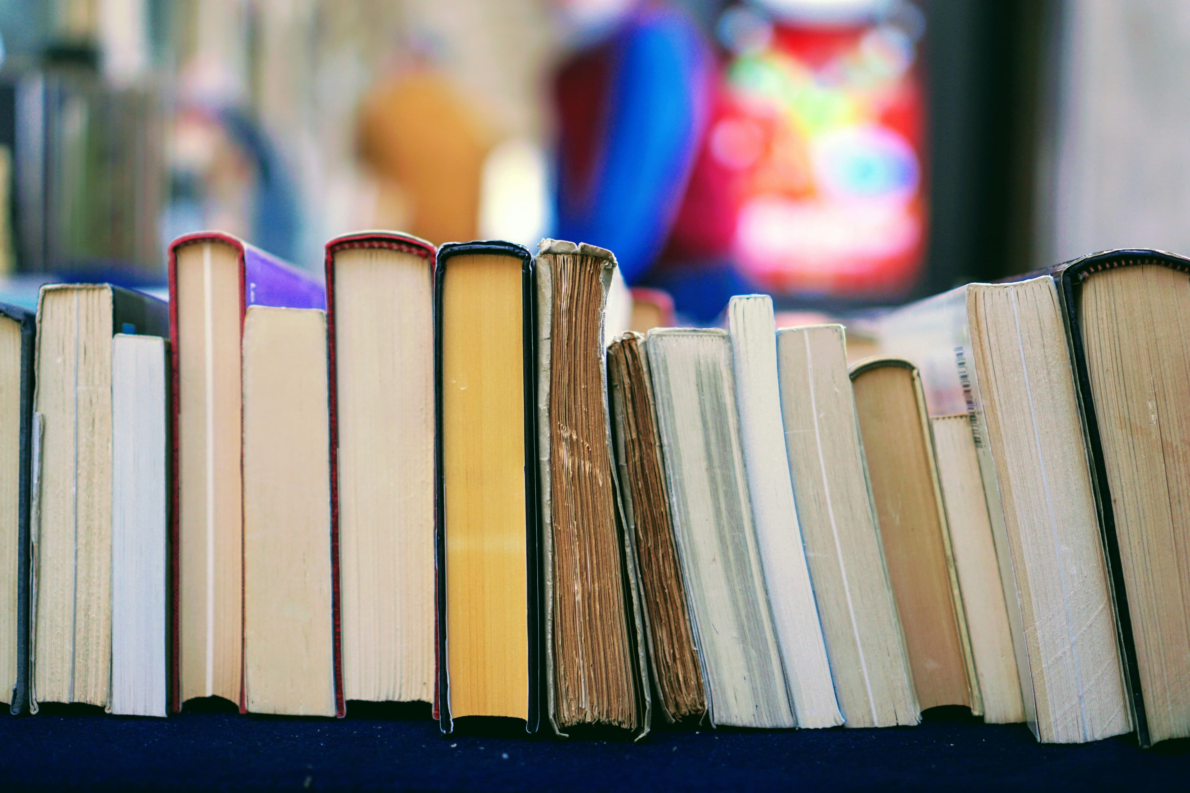 Open books stacked on a table
