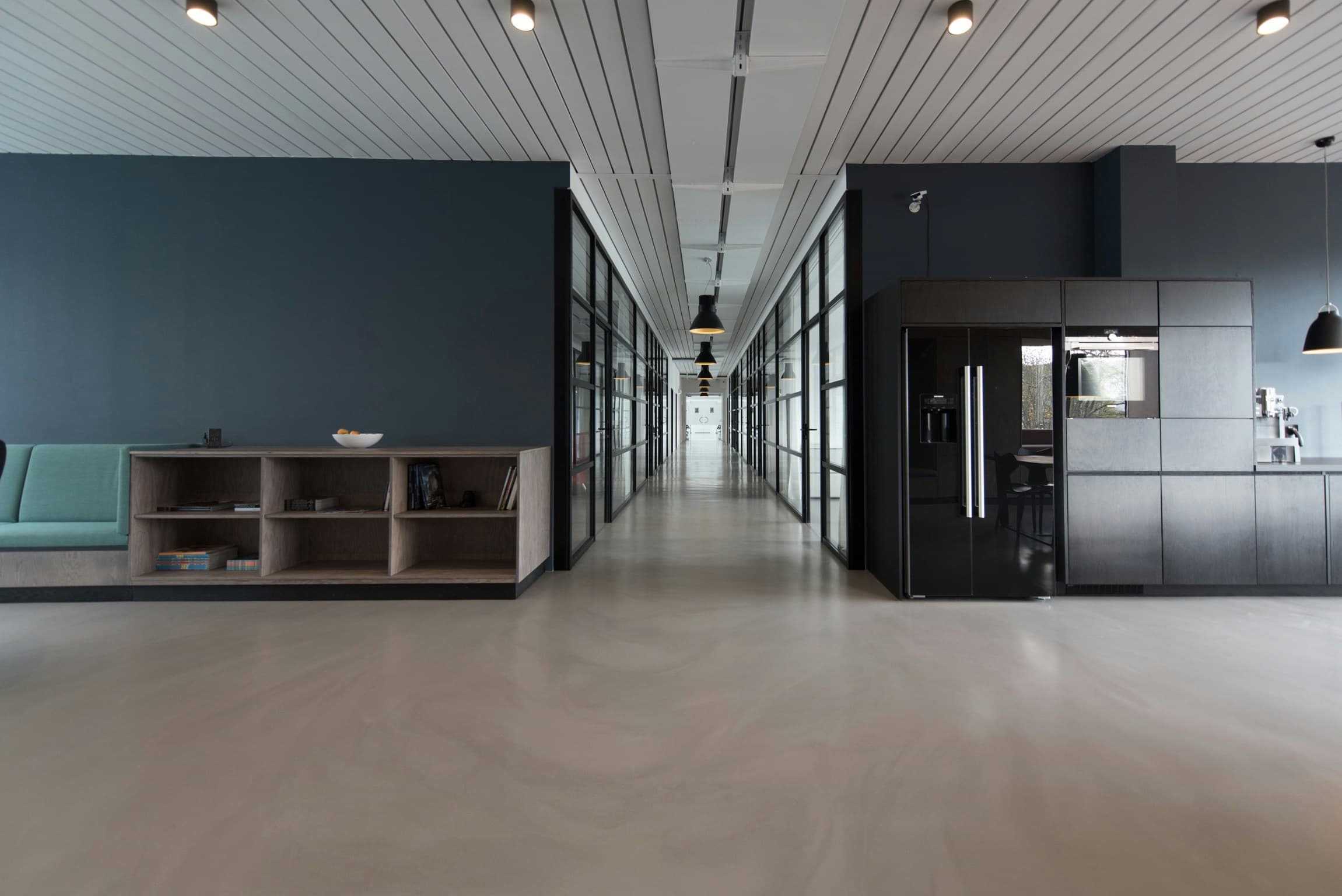 Bright modern office with glass walls and natural light