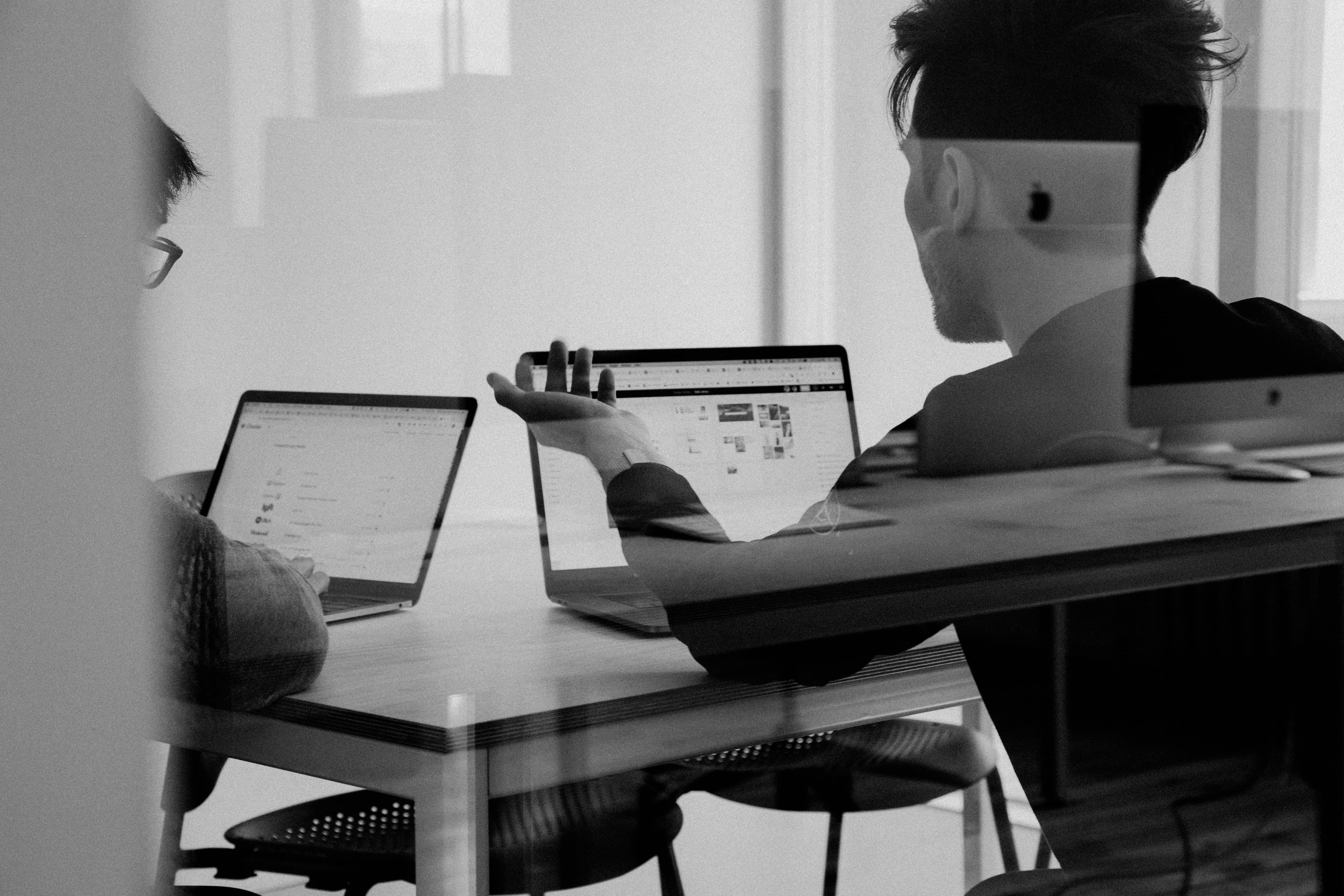People working together at a bright conference table